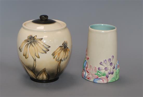 A Clarice Cliff brush pot and a Moorcroft vase and cover tallest 15cm